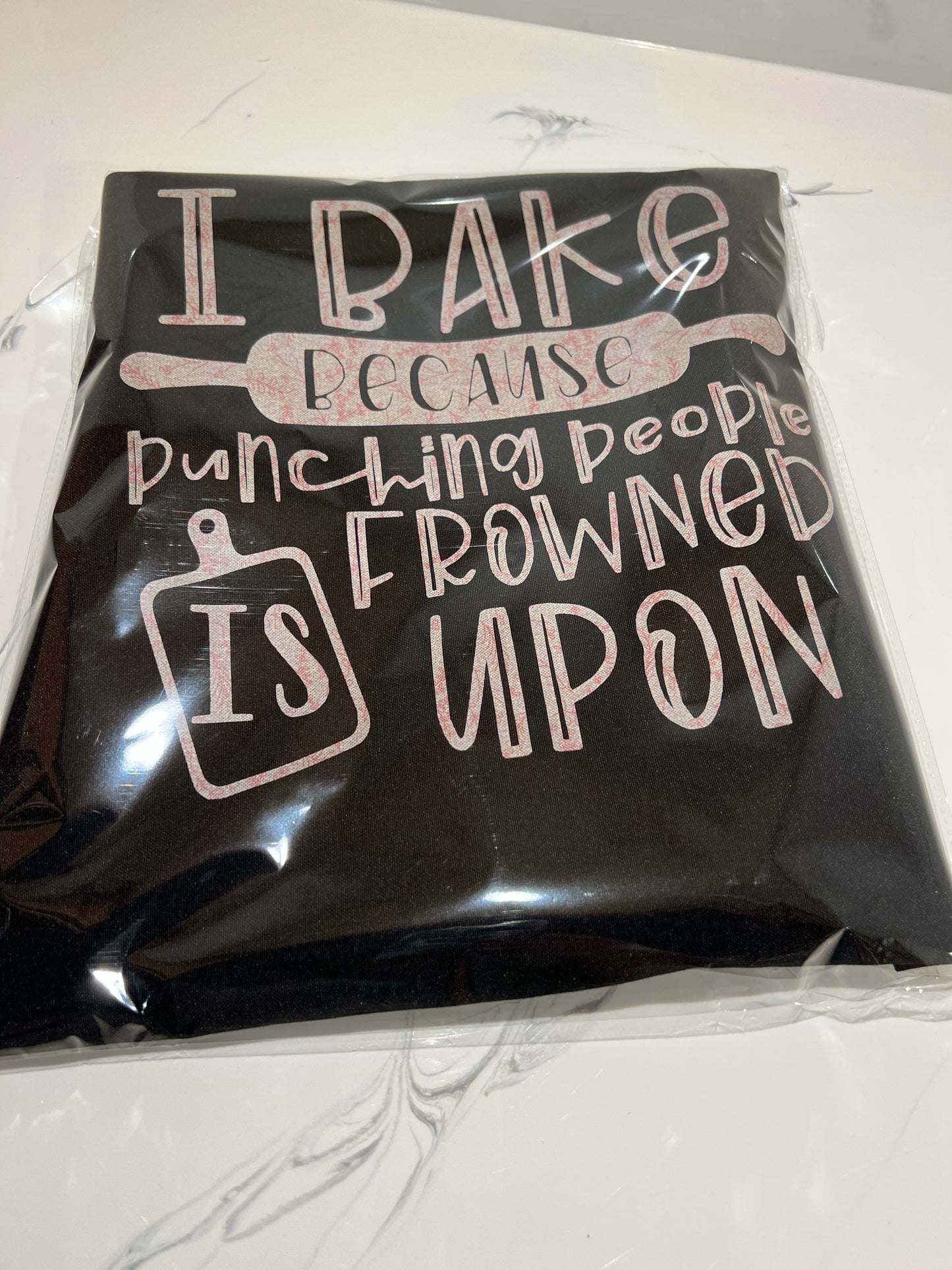 Don't mess with the cook, aprons for her!